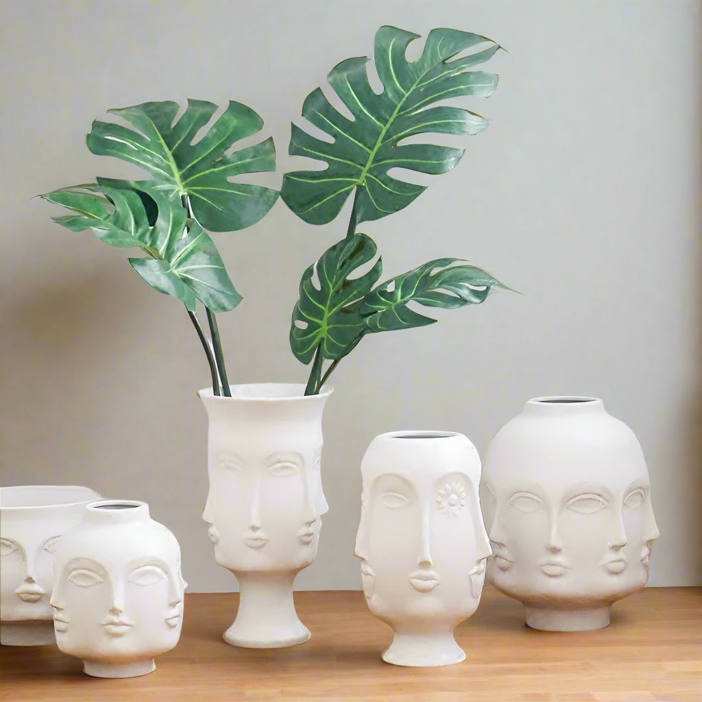 FacetedFlora Expressive Ceramic Face Vase for Artistic Displays